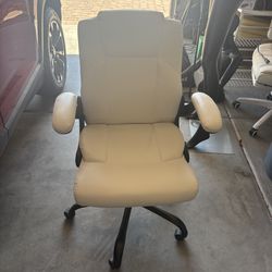 White Faux leather office chair with flip up arms