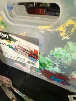 Liquitex art bin and various acrylic paints