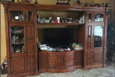 Brown wooden home entertainment system with light -center