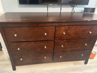 Bedroom furniture includes Cal King bed frame