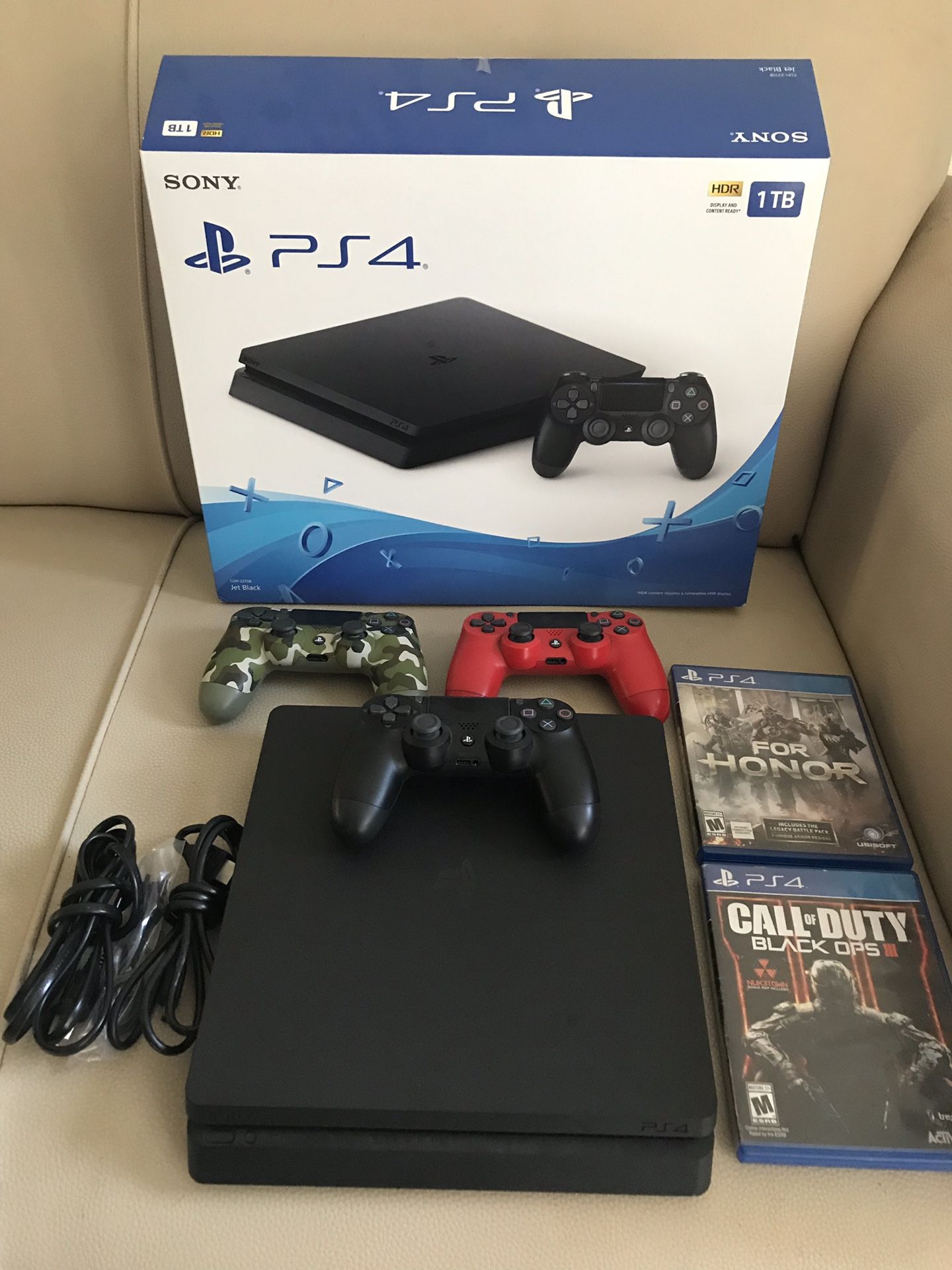 PS4 slim 1000GB, wireless turtle beach headset, and controllers