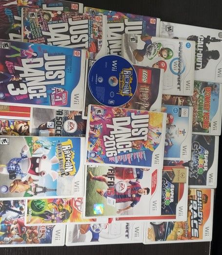 A Bunch Of Wii Games With Cases