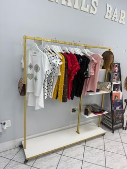 Gold and White Rolling Clothing Display Rack