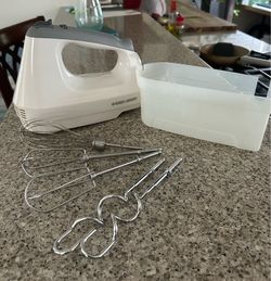 Black and Decker hand mixer with storage