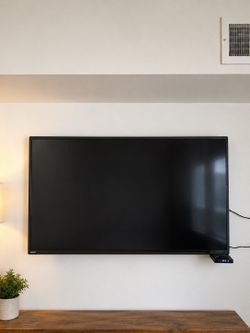 Phillips 55in TV with mounting bracket