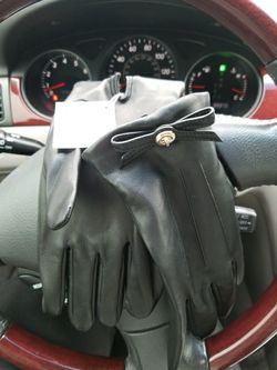Leather gloves. Coach. Brand new. Black