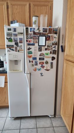 Maytag Refrigerator Freezer side by side with front ice/water dispenser. . Works excellent