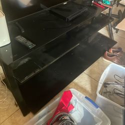 TV Console With Shelves. DVD Player And Roku Stick Included With Purchase