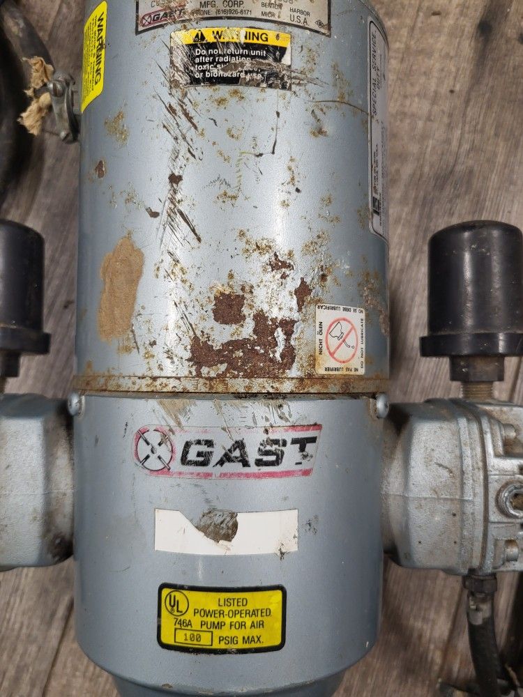 Gast 1/6 HP Air Compressor, specifically a power-operated pump for air with a maximum pressure of 100 PSIG