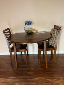 Dining Room Table and 2 chairs.