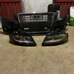 2010 Audi Head Lights And Front Bumper 
