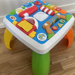 Laugh & Learn Baby to Toddler Toy, Around the Town Learning Table with Music Lights & Activities.