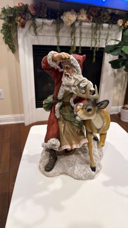 Home Interior Santa Clause accompanied by reindeer