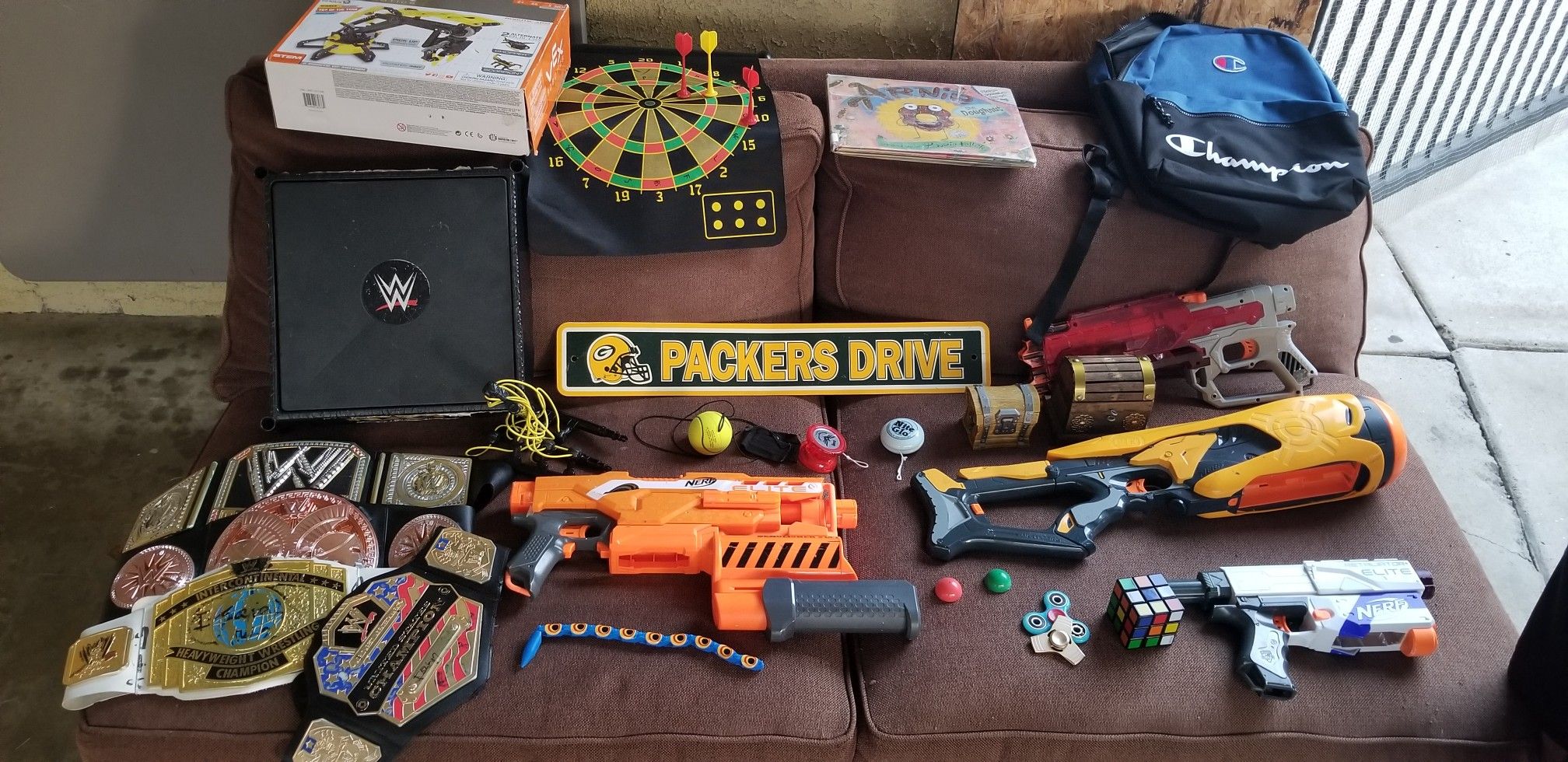 Toys nerf guns, WWE, Lego, fornite, packers, Spinners Ages 7 and up