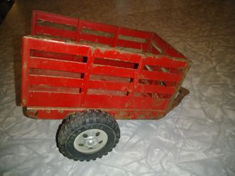 1950's Tanka toy stake bed Trailer. It's a Tanka toy trailer