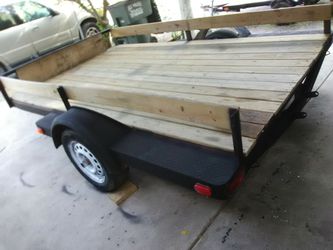 Trailer 6x10 new light new jack and chains new treated flooring