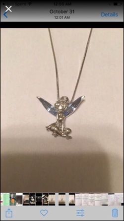 Silver Tinkerbell with Silver chain. Brand new. Never worn.