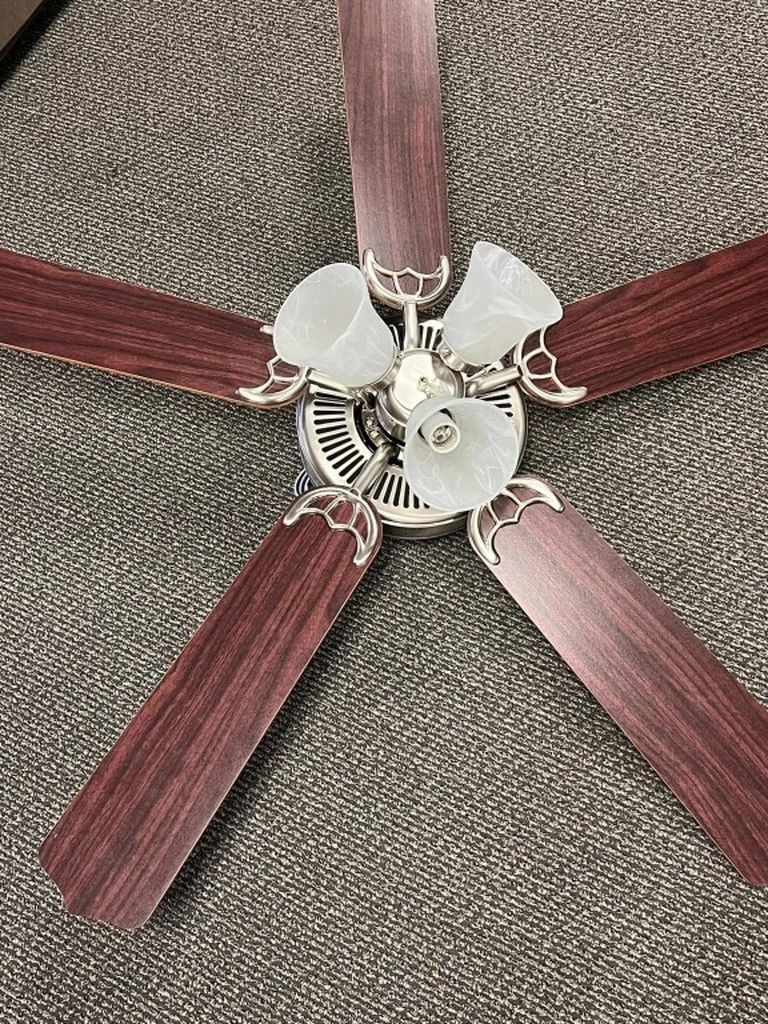 New in box. 52" Indoor Ceiling Fan with 5 Reversible Blades and 3 Light.
