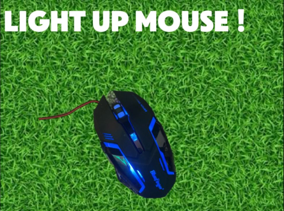 Light up gaming mouse that changes color with the click of a button