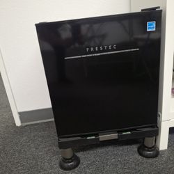 Frestec mini refrigerator for sale.