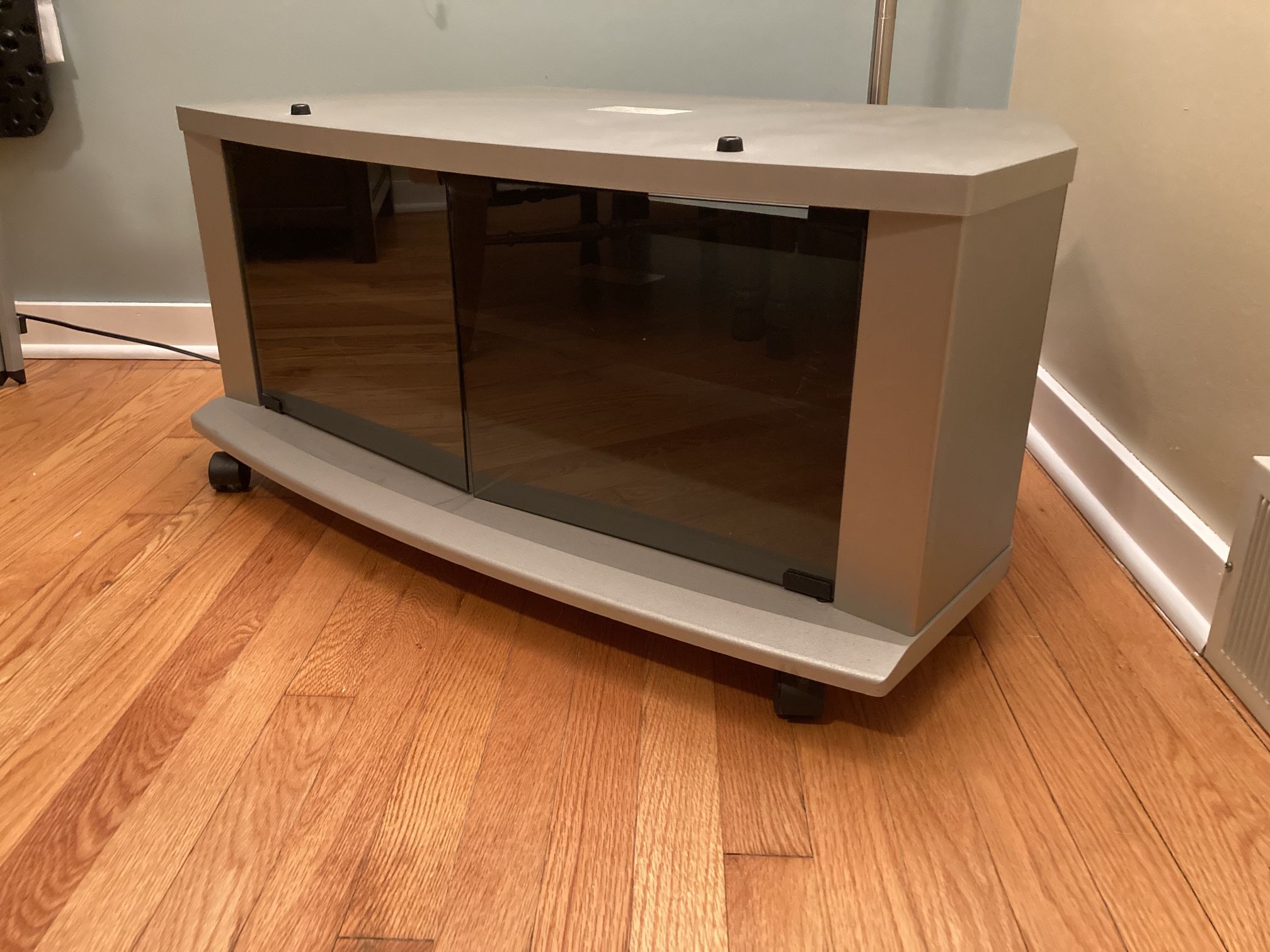 Hitachi Glass Front TV Stand On Wheels
