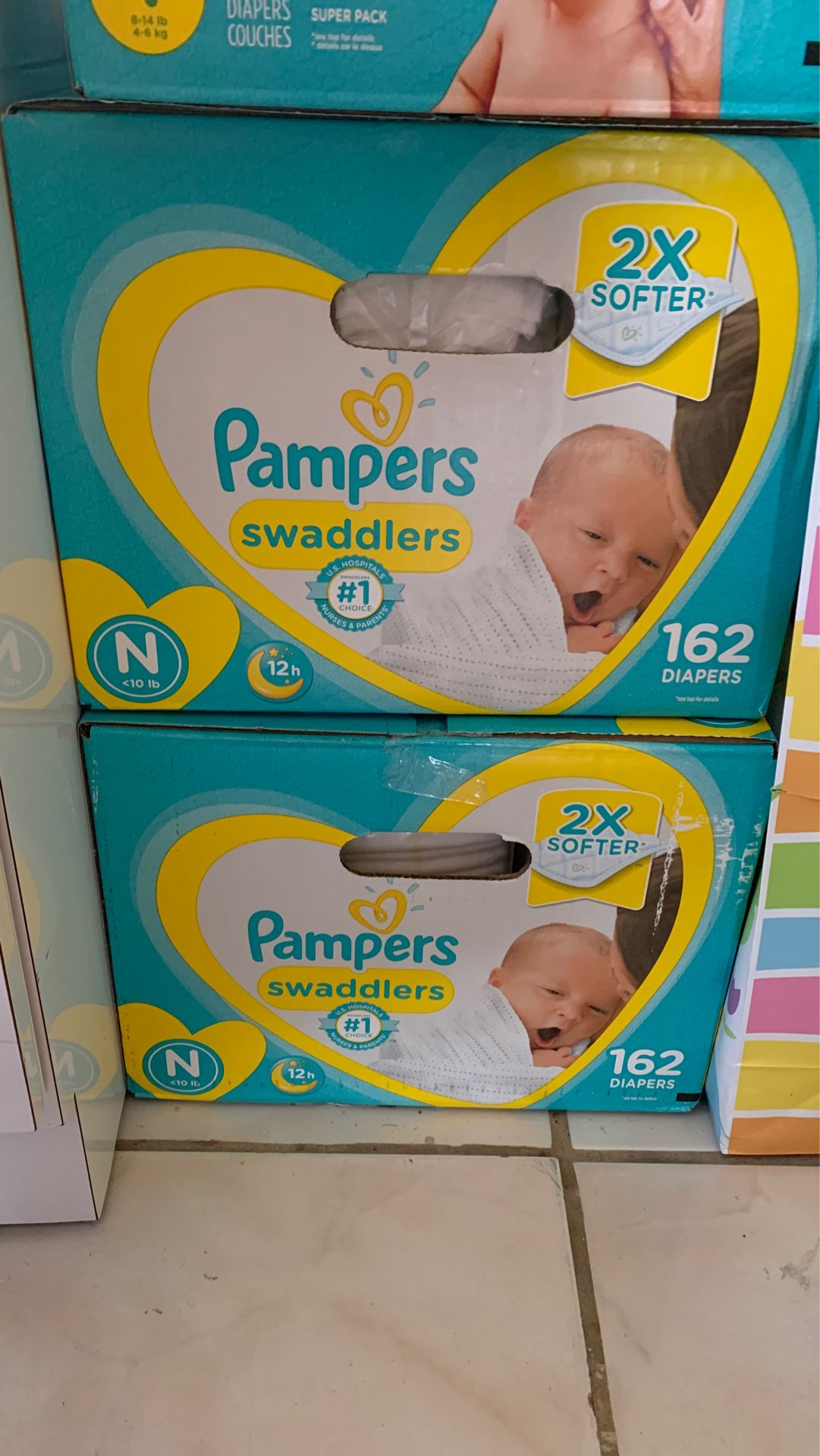 2 boxes of newborn pampers 30$ for both