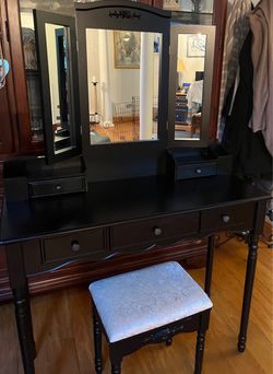 Black vanity and chair