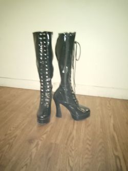 Black, Lace Up ,Go Go Boots With 5 Inch Heels. And Zipper On Side. 