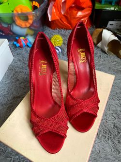 Brand new red jlo heels