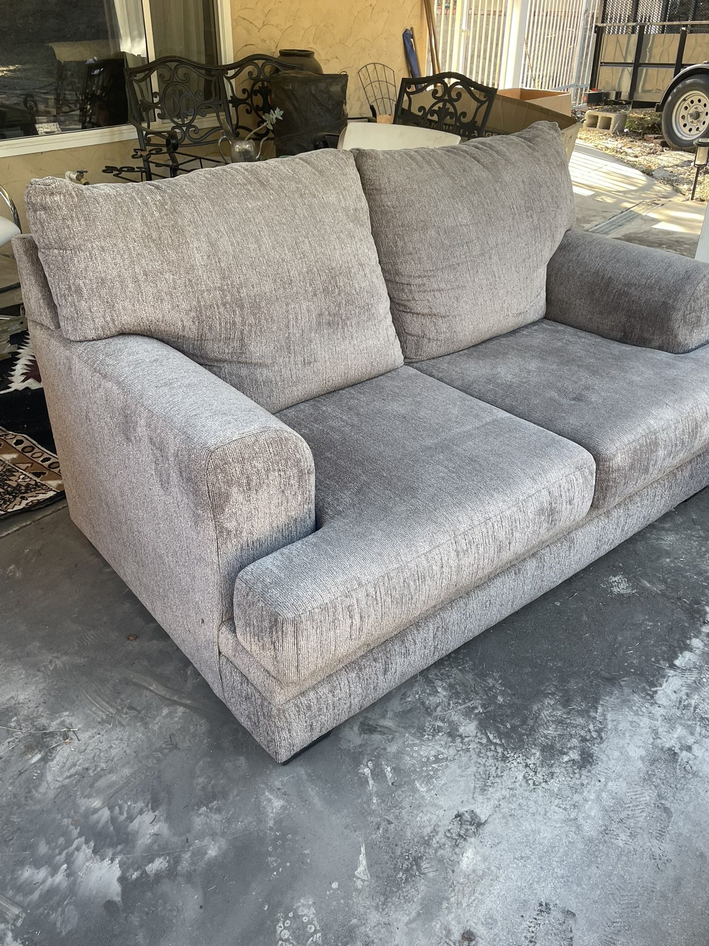 love seat couch gray color no rips, no pets in home  