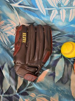 Wilson elite baseball/  softball glove 13, inch.# 82477 barely used