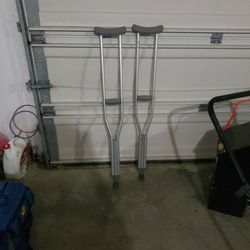 Adjustable crutches