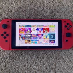 NINTENDO SWITCH LOADED with OVER 100 GAMES MARIO PARTY,MARIO KART,POKEMON ARCEUS, ZELDA,GTA and More