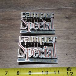 Original camper special badges 