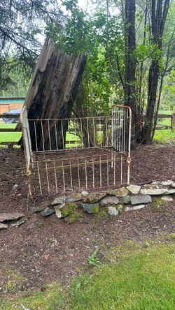 Vintage iron/metal baby bed garden art