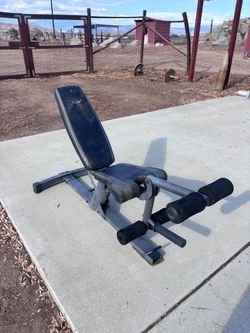 Workout bench and leg lift for plates