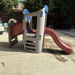 Little Tikes Slide & Hide Tower Climber with 2 Slides. It Has Two Cracks, Still works fine.  See Pictures. 