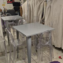 Table and 6 Kartell Crystal Stools