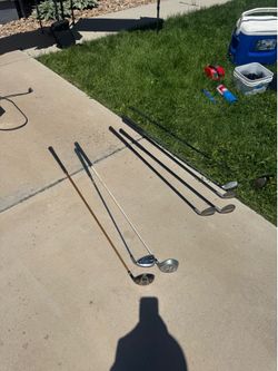 Variety of lefty and right golf clubs