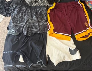 17 pairs of various Nike, Under Armour & Campus Heritage shorts