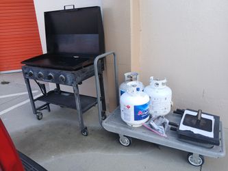 Black stone with propane tanks $300firm