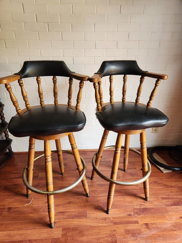 2 swivel bar stools 