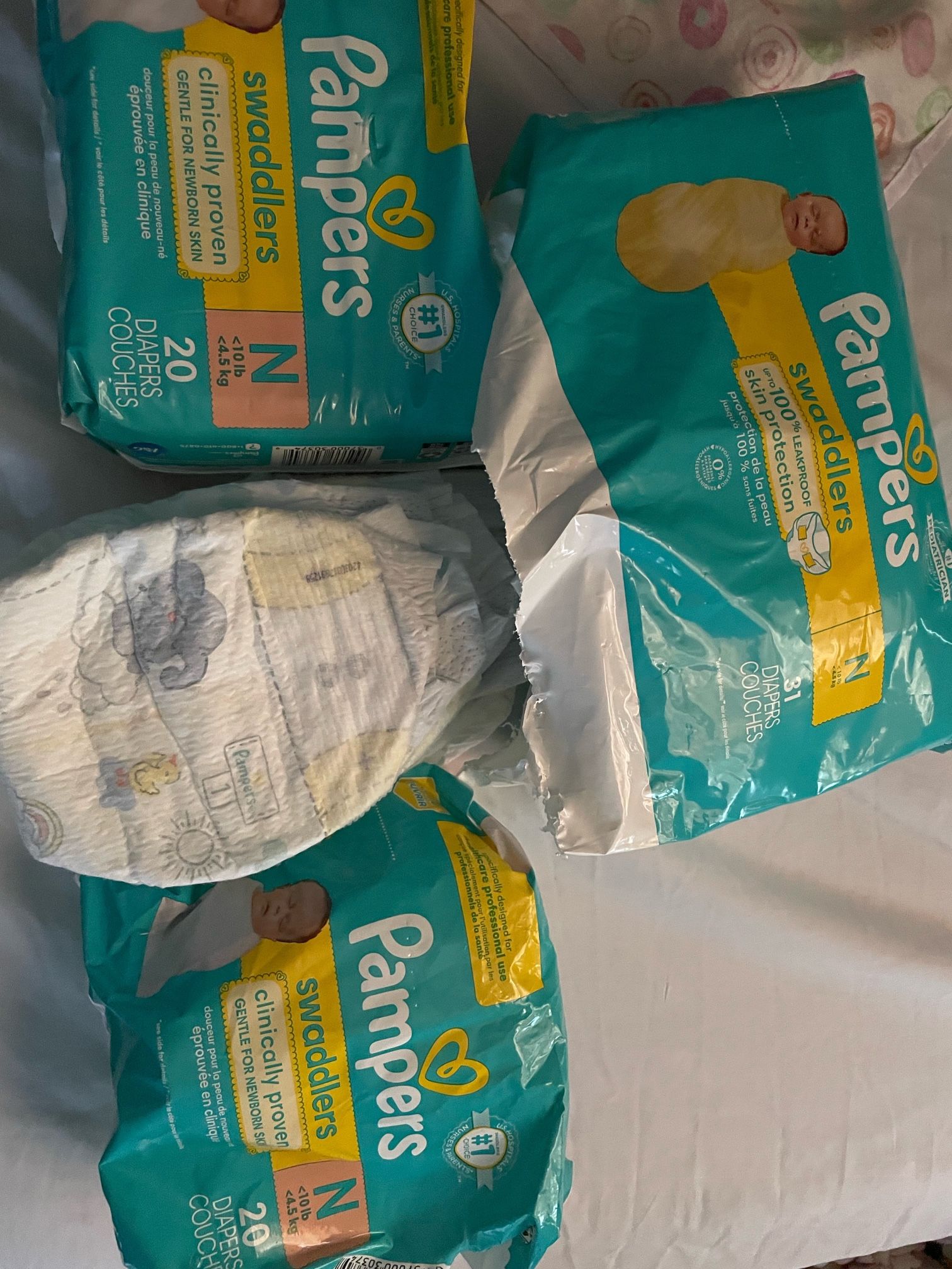 Pampers And Huggies Size N Diapers