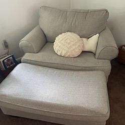 Ashley Furniture Love Seat And A Double Wide Chair With An Ottoman
