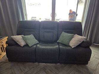 2 Power Reclining Leather Sofas - Signature by Ashley
