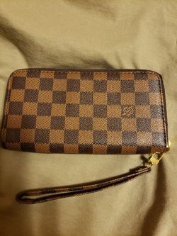 LV Wrist wallet.
