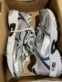 Woman’s Size 9 FILA Silver Tytaneum Sneakers 9