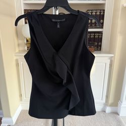 White House Black Market (WHBM) sleeveless asymmetrical peplum top