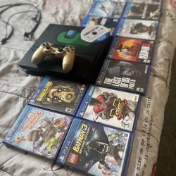 Ps4 with gold controller and 12 games
