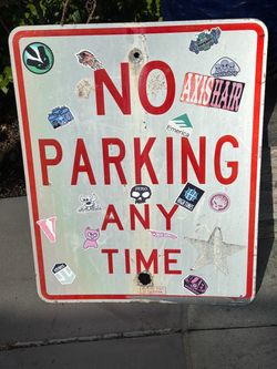 Metal No Parking sign